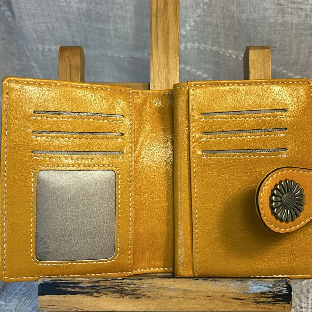 NWOT leather sunflower closure bifold large wallet